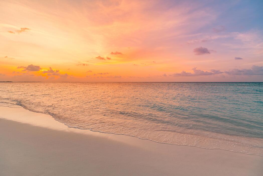 A tropical beach at sunset
